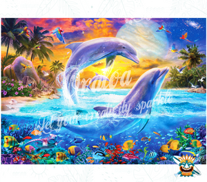 Playa jugando con delfines
